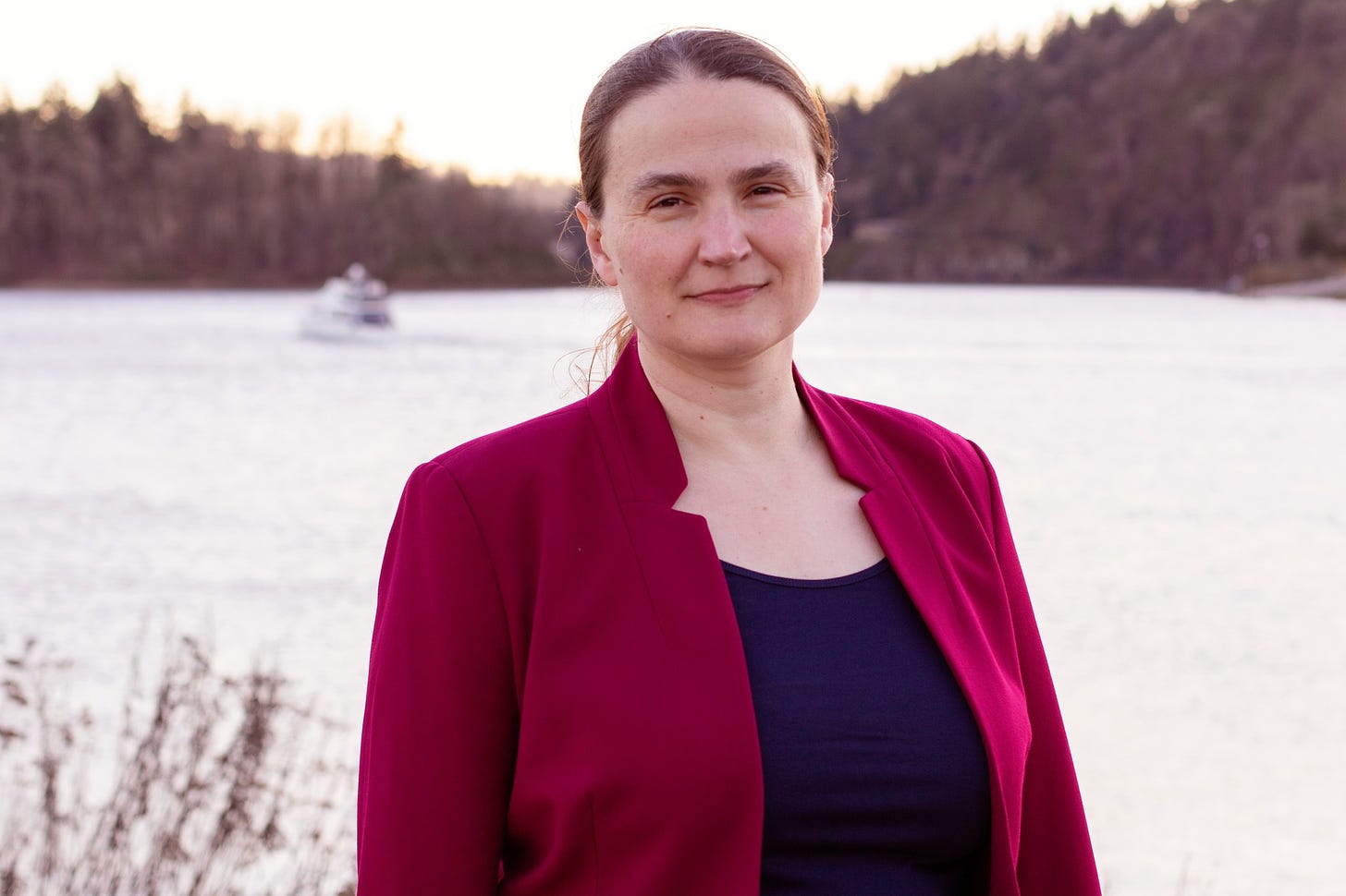 May be an image of 1 person, standing and lake