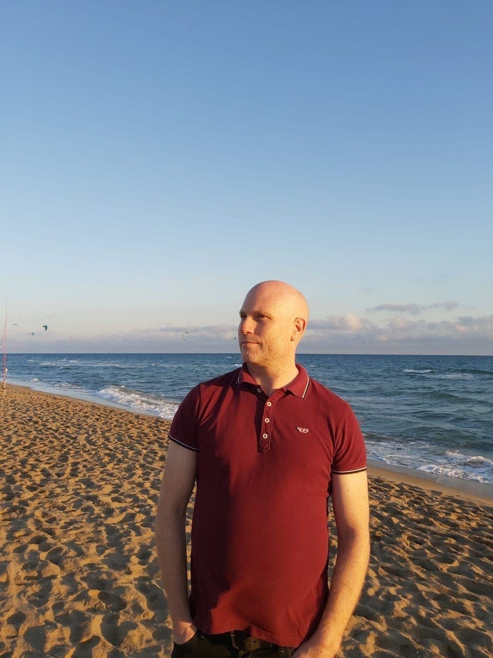 May be an image of 1 person, standing, ocean and sky