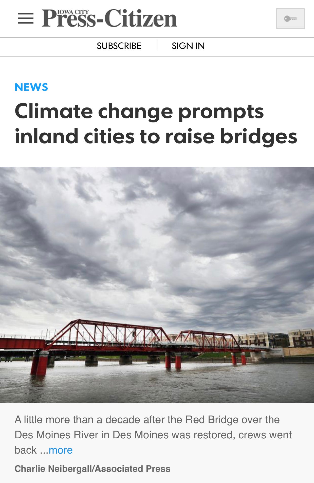 Iowa City Press Citizen front page with headline: Climate change prompts inland cities to raise bridges, and a phot of a red bridge in Des Moines, Iowa