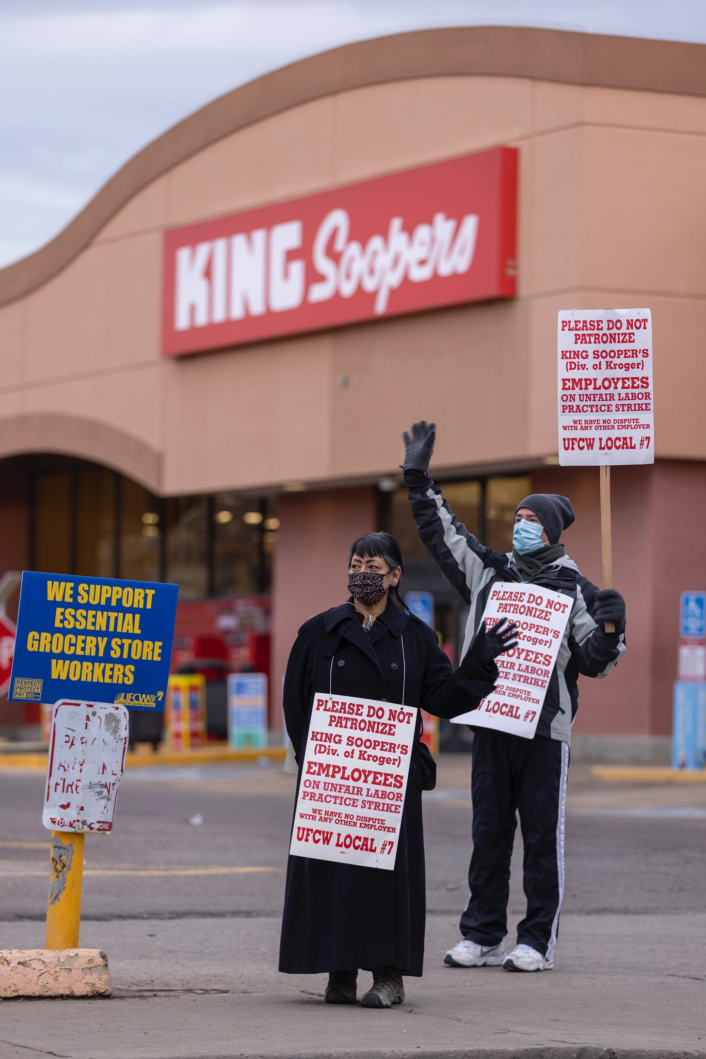 Gigi Jones said she is striking because she currently has to work overtime at her King Soopers job and work part-time at two other jobs to pay her bills. She is hoping a new contract could help her work less. Gigi removed her mask for the portrait then put it back on to return to picketing