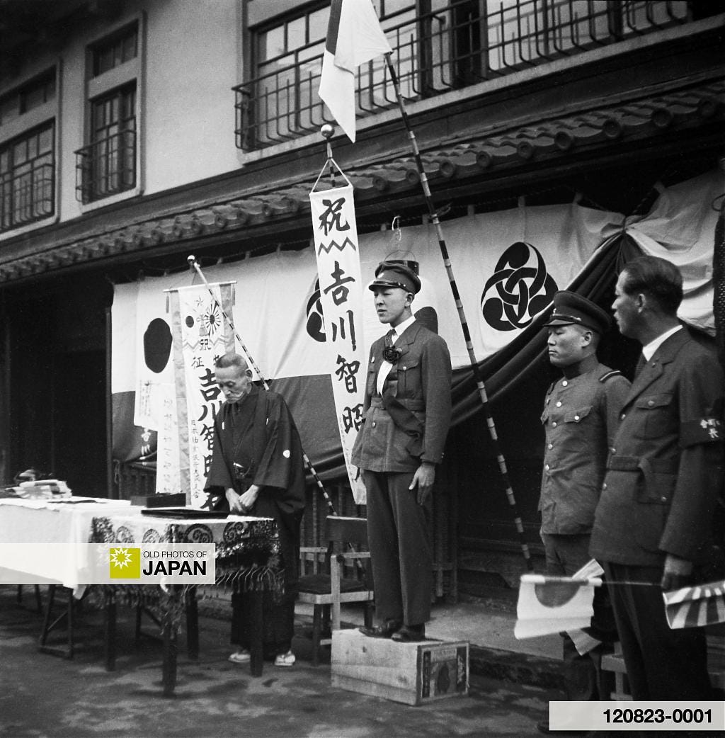 A private Japanese home is decorated to bid a son going to war farewell.