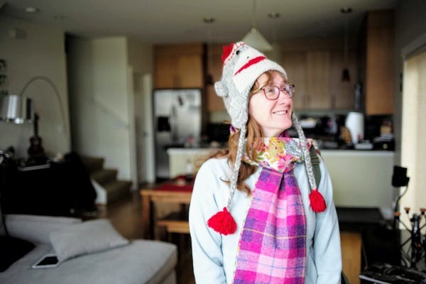 Here’s Chris, clad in her favorite monkey hat, looking out into the distance, beaming with gobs of happiness and pride that she’s a loyal reader of The Highlighter.