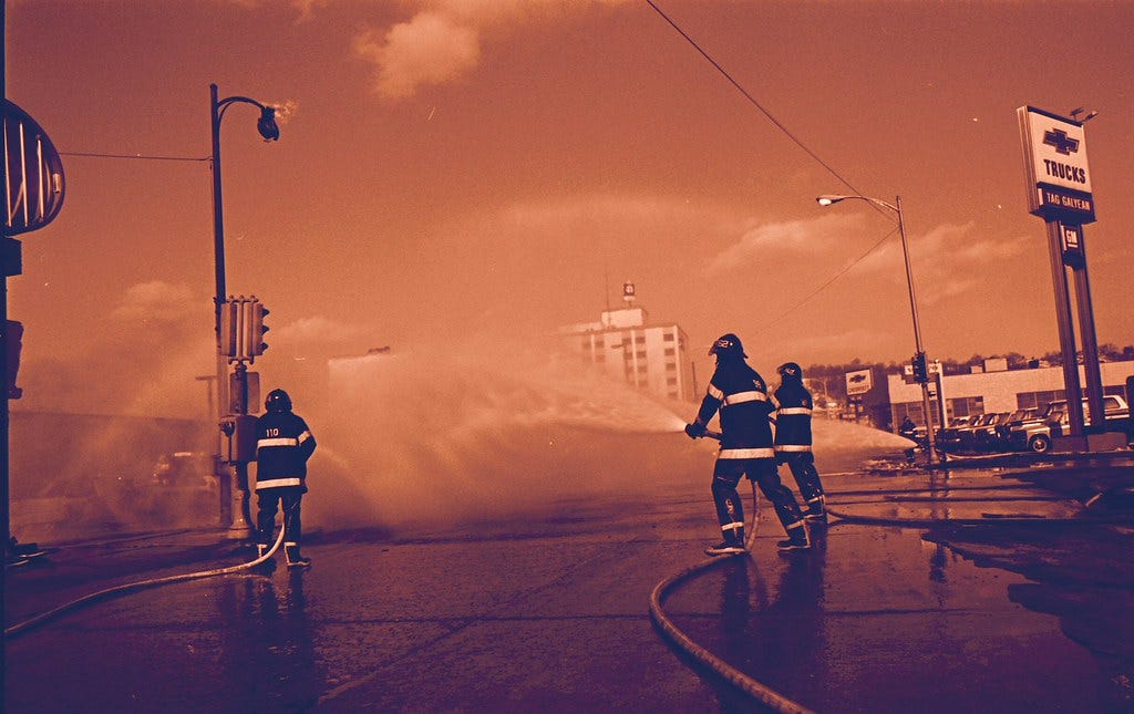 "Firefighters" by starmanseries is licensed under CC BY 2.0.