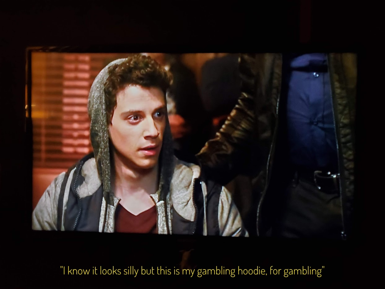 Kyle, a young white man with curly dark hair and a hoodie pulled up onto his head, captioned "I know it looks silly but this is my gambling hoodie, for gambling"