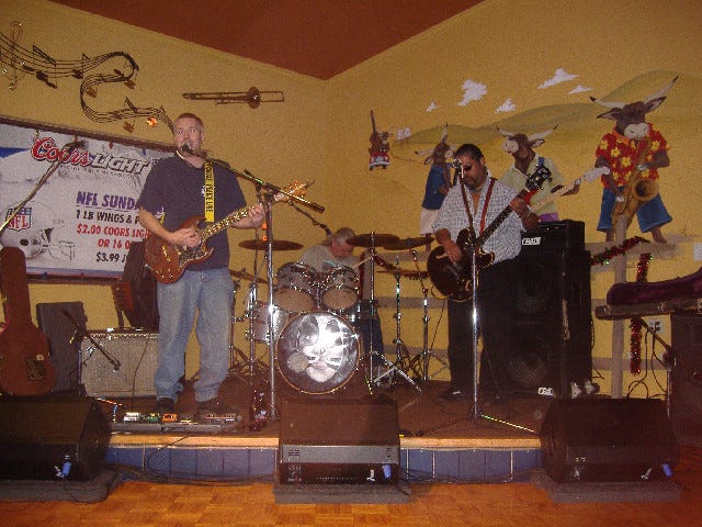 The Aaron Howell Band (Aaron's on the left) led things off with straight-ahead blues-based rock, mostly covers.