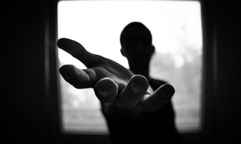 Man’s hand in shallow focus