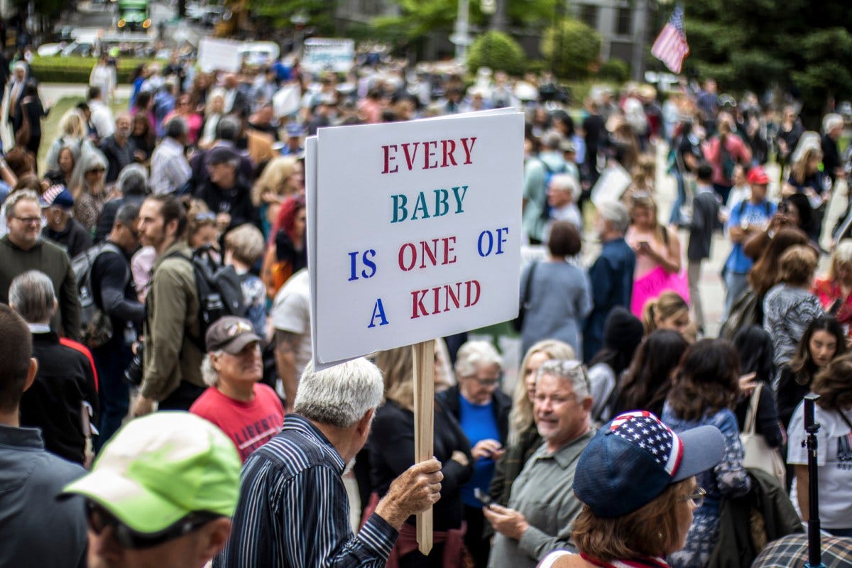 Protestors gather to rally against AB 2223, at the state Capitol in Sacramento on Tuesday, April 19, 2022. Photo by Rahul Lal for CalMatters