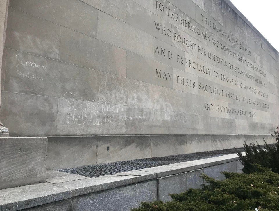 r/Brooklyn - Someone has been defacing the WWII Memorial in Cadman Plaza with PewDiePie graffiti