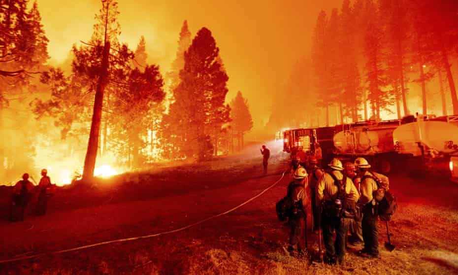 A fire rages in the Eldorado National Forest in the Sierra Nevada mountain range in California in August
