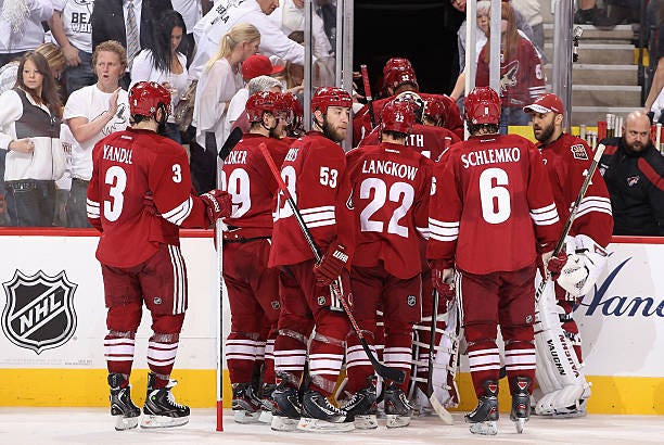 The Phoenix Coyotes skate off the ice in Game Five of the Western Conference Finals during the 2012 NHL Stanley Cup Playoffs against the Los Angeles...