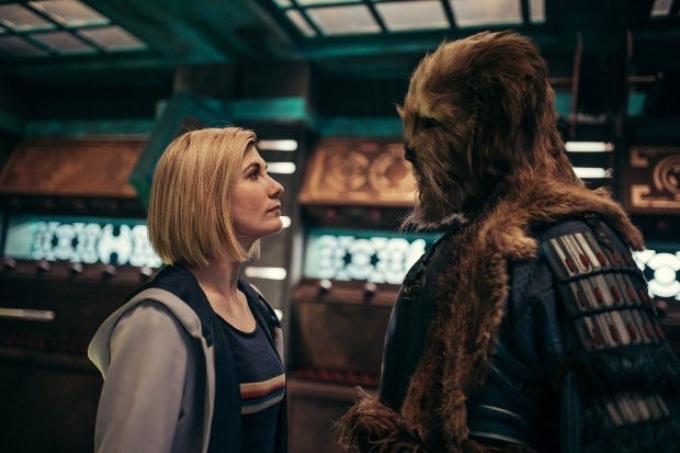This still image from "The Halloween Apocalypse" sees the Thirteenth Doctor (played by Jodie Whittaker) and Karvanista (played by Craige Els) stare each other down. This still image from "The Halloween Apocalypse" sees the Thirteenth Doctor (played by Jodie Whittaker) and Karvanista (played by Craige Els) stare each other down.