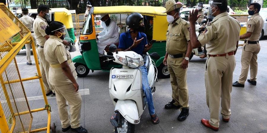 Police intercept motorists during the lockdown in Bengaluru. (Photo | Ashishkrishna HP, EPS)