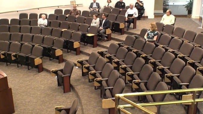 A largely empty auditorium