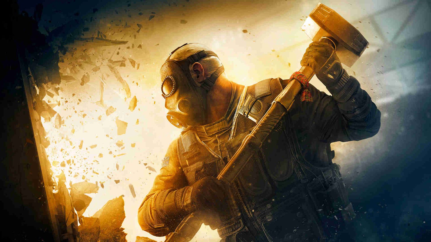 A masked guy holding a sledgehammer in Rainbow Six Siege