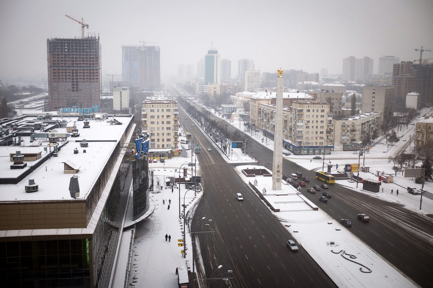 A view from a tall building above a snowy Kiev.