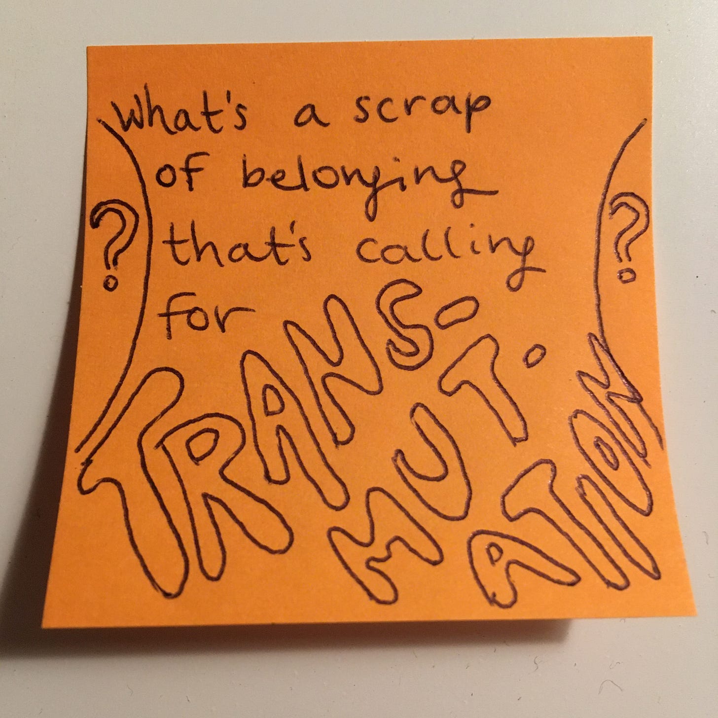 orange sticky note with question marks at both sides that reads: what's a scrap of belonging that's calling for transmutation