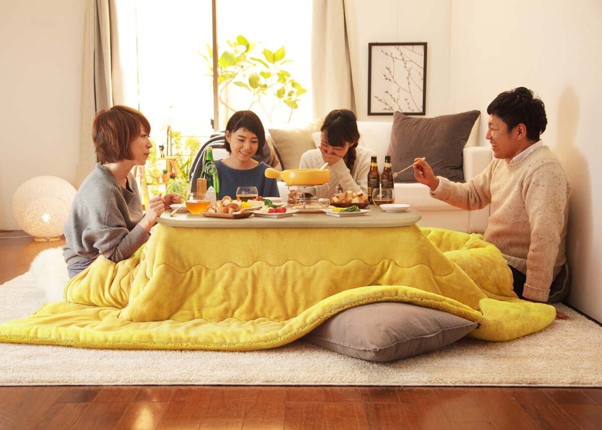 Cosy dining around a kotatsu table (炬燵))