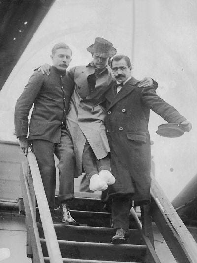 Junior Wireless Officer Harold Bride is carried off the Carpathia in New  York : r/RMS_Titanic