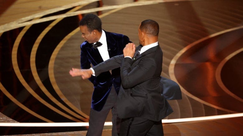 Will Smith slaps, swears at Chris Rock during live Oscars broadcast | CBC  News