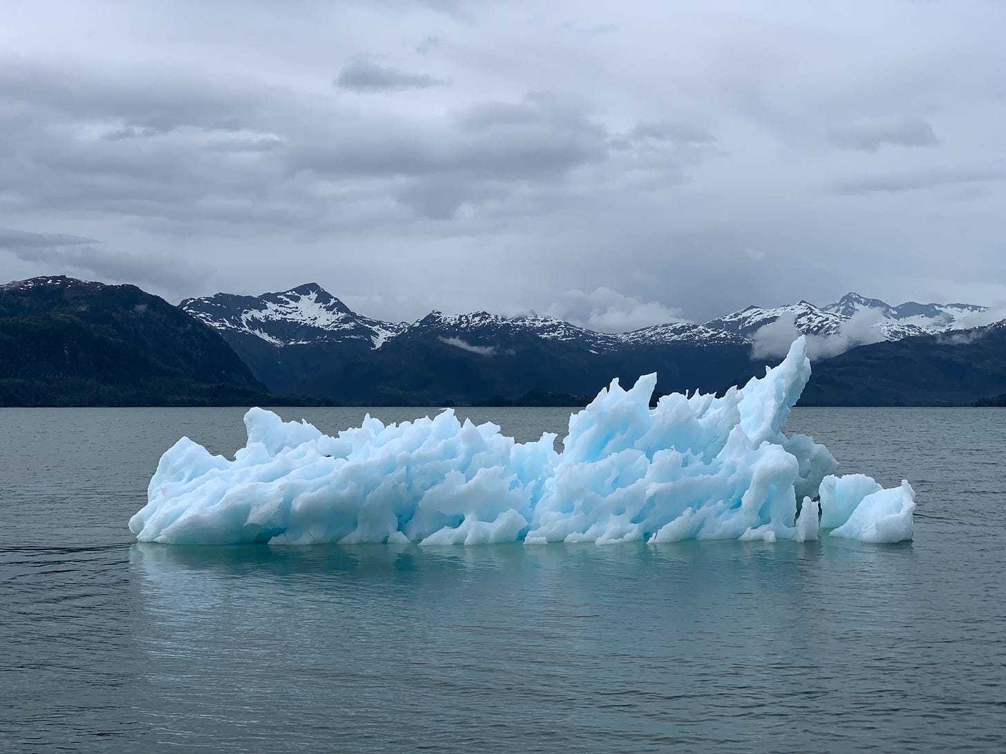 Photo of a small, jagged iceberg.