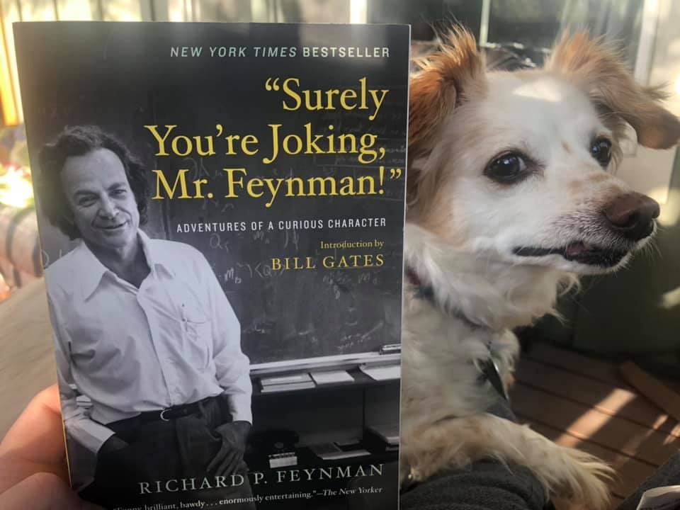 May be an image of 1 person, dog and text that says 'NEW YORK TIMES BESTSELLER "Surely You're Joking, Mr. Feynman!" ADVENTURES OF CURIOUS CHARACTER Introductionby BILL GATES'