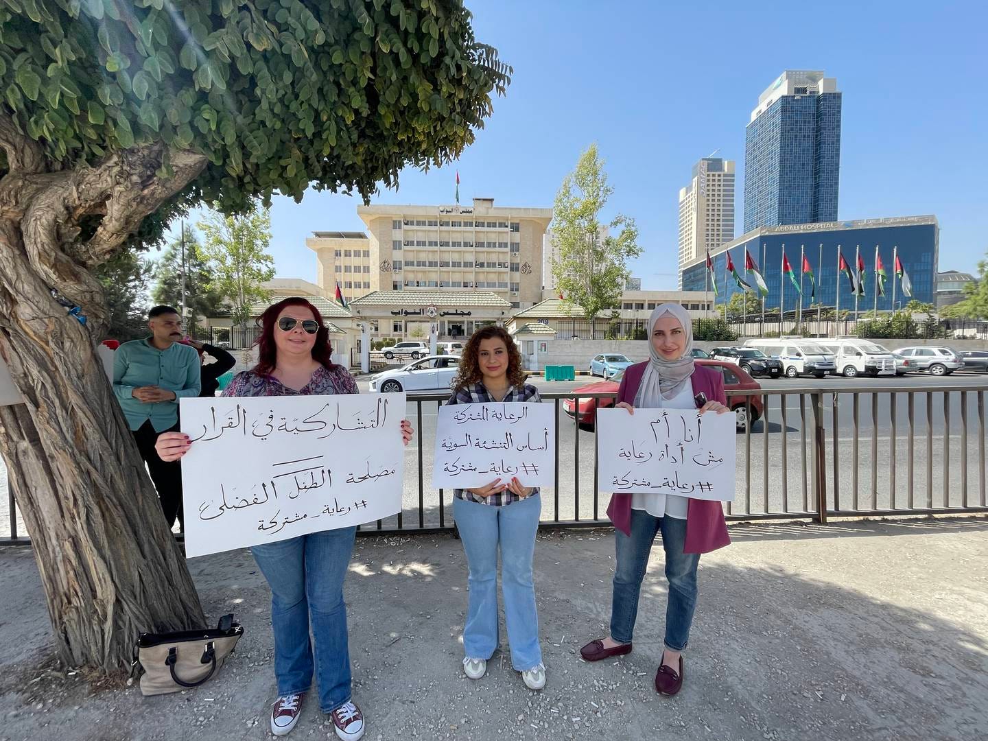 Three women protested on Sunday in front of Jordan’s parliament against a new law granting only the father a say in a child’s education, in low turnout reflecting little public outcry in the kingdom regarding curbs on women’s rights.