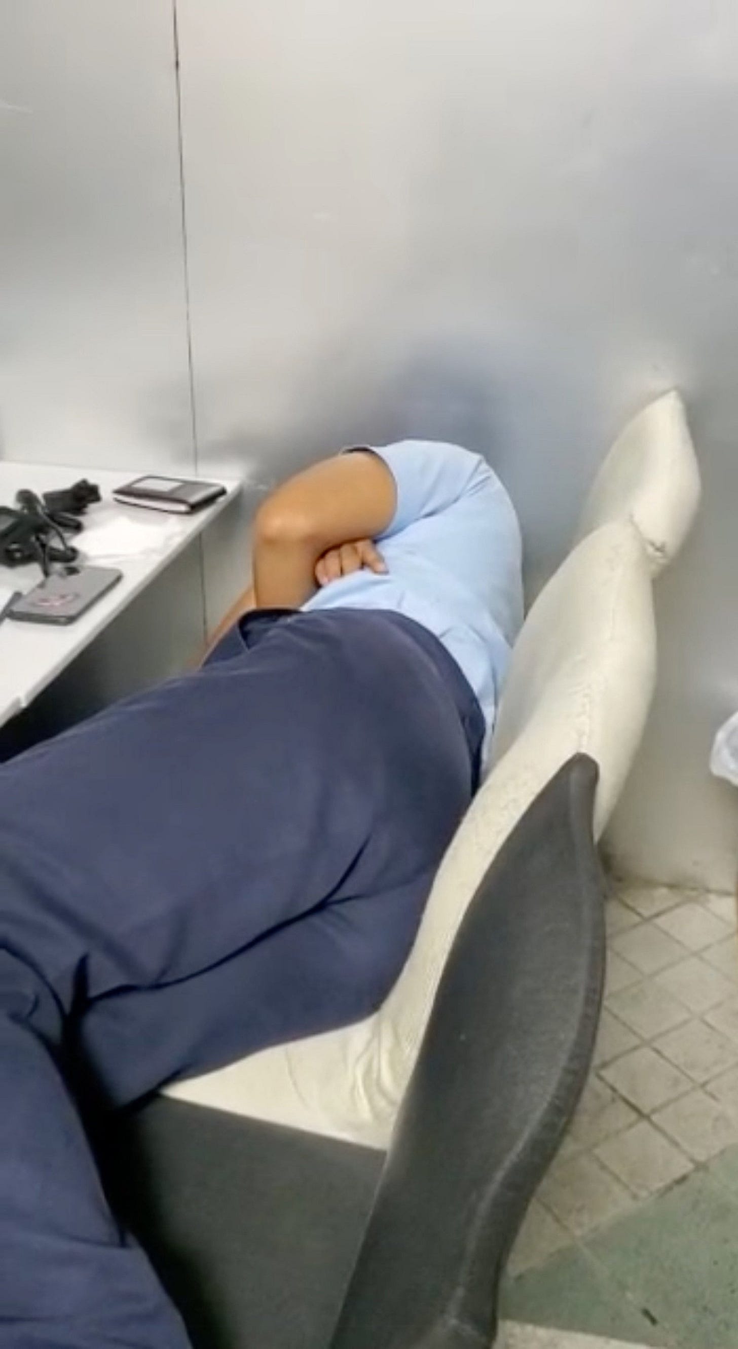 A screenshot of the clip, which shows the officer taking a nap. Photo: Handout