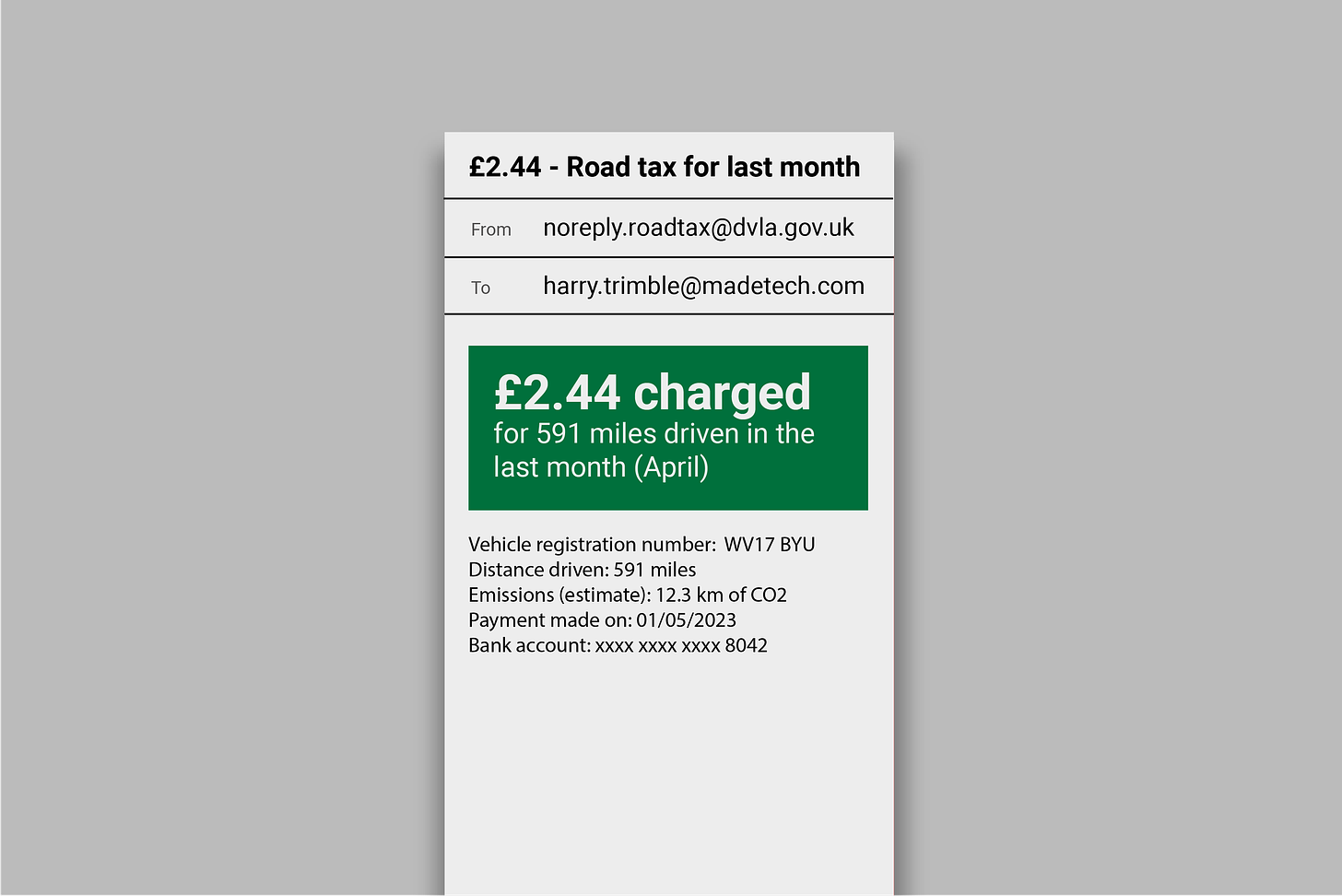 Email on phone screen reading '£2.44 - Road tax for last month'