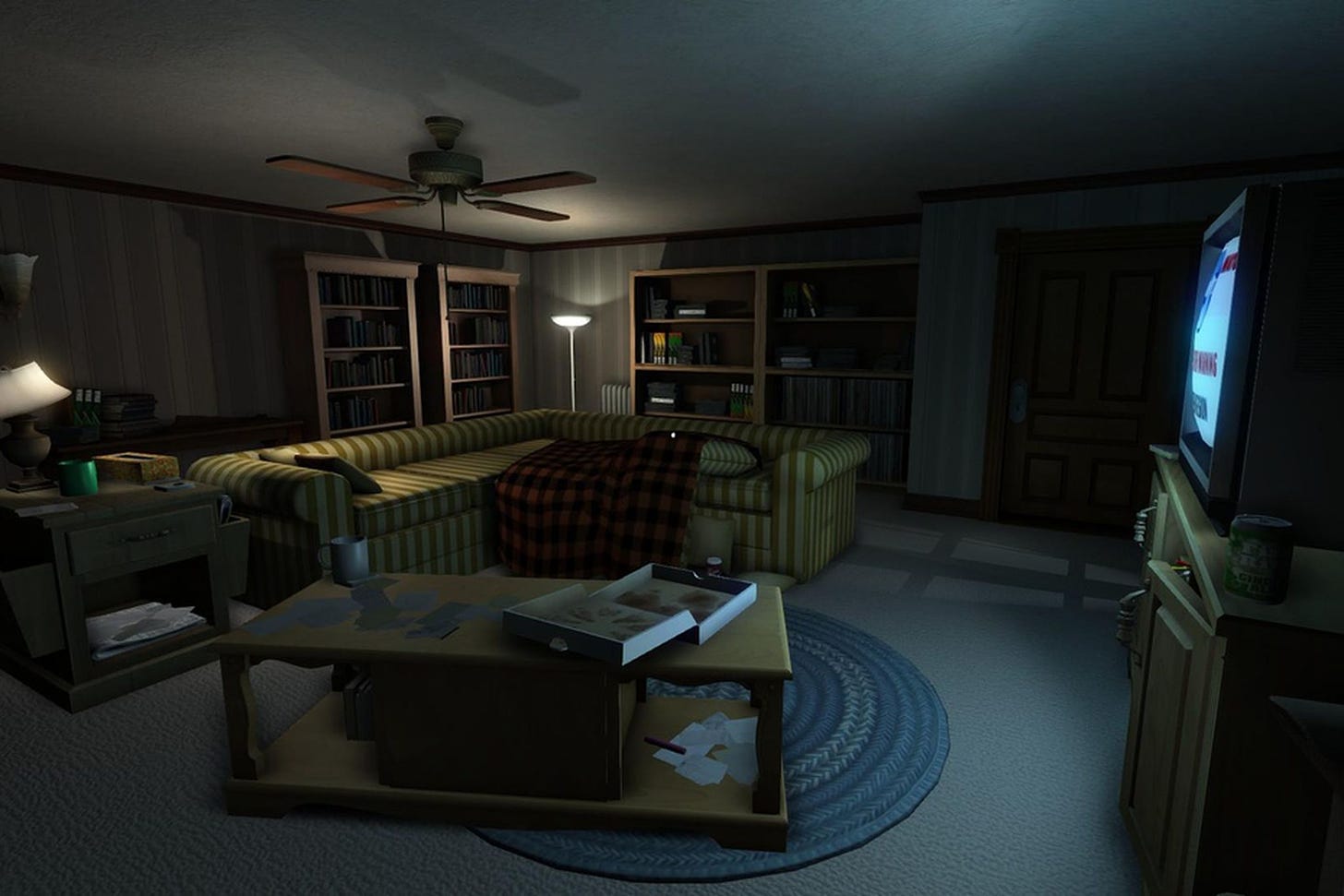 Screenshot from the game. A dimly lit sittingroom. The TV is on, set to a storm warning card. An empty pizza box sits on the coffee table.