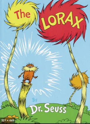 The cover of the Lorax by Dr. Suess. The background is sky blue and shows green roling hills with fluffy red and yellow trees towering above an orange and fuzzy Lorax on a yellow tree stump. 