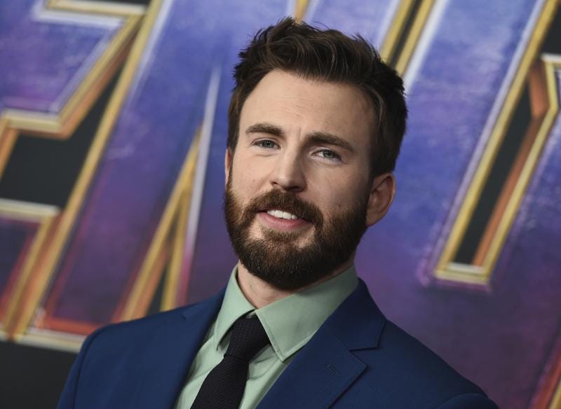 FILE - Chris Evans arrives at the premiere of "Avengers: Endgame" on April 22, 2019, in Los Angeles.  The “Captain America” star has a new title — he's been named People magazine's Sexiest Man Alive. The selection was announced Monday night, Nov. 7, 2022, on Stephen Colbert's late night show and on the magazine's website. (Photo by Jordan Strauss/Invision/AP, File)