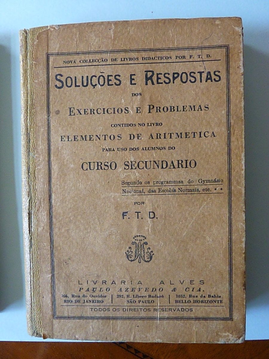 Contracapa do livro “Soluções e Respostas dos Exercícios e Problemas contidos no livro Elementos de Aritmética”, impresso pela FTD em 1936.
