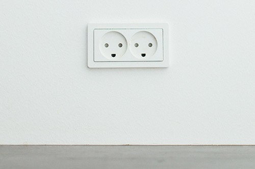2 electrical outlets that kinda look like faces