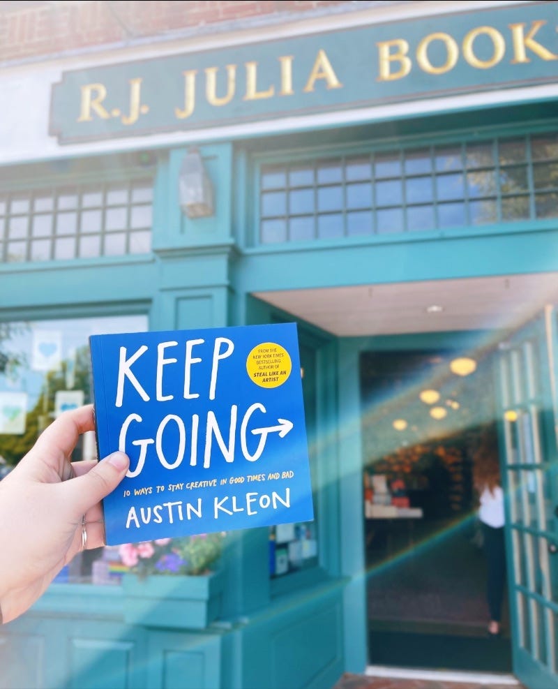 a photo of keep going in front of rj Julia booksellers