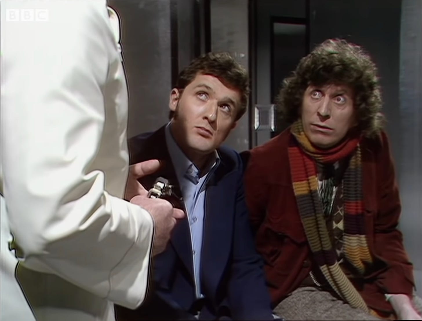 Ian Marter as Harry Sullivan (left) and Tom Baker as the Doctor (right) in DOCTOR WHO.