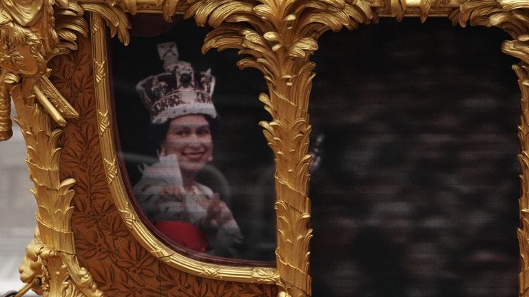 A hologram of Queen Elizabeth II during her coronation in the Gold State Coach during the Platinum Jubilee Pageant in front of Buckingham Palace, London, on day four of the Platinum Jubilee celebrations. Picture date: Sunday June 5, 2022.
