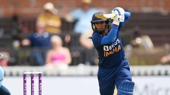 Women's cricketer playing a cricket shot