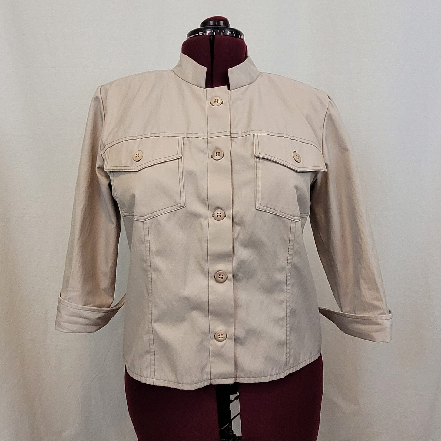 Handmade jacket in a taupe cotton poly fabric with gray topstitching and 3/4 length sleeves