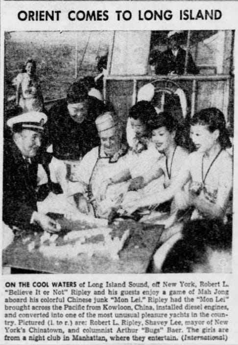 alternate version of first photo in the newsletter as it appears in a newspaper with the heading: "Orient Comes to Long Island" and a caption that fails to mention AMW