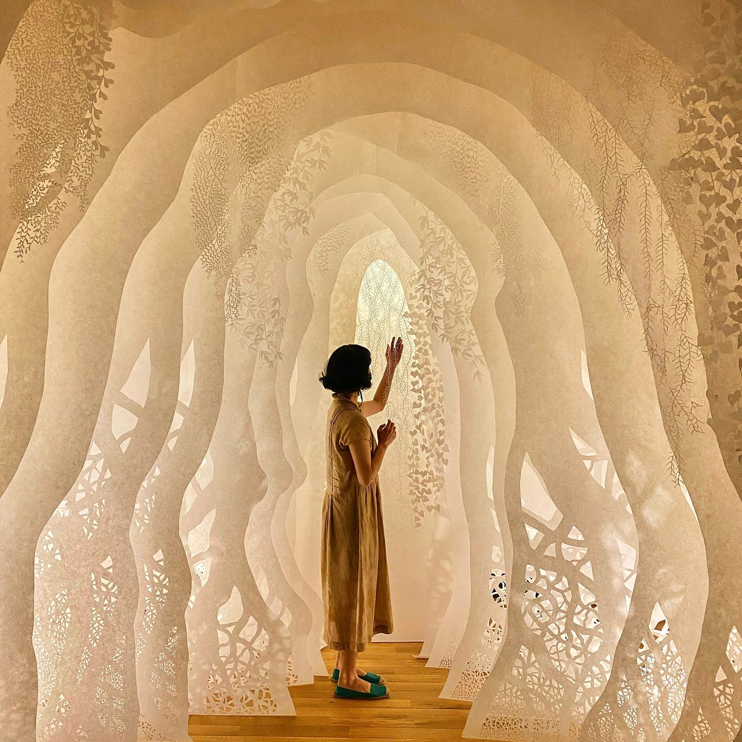 A photograph of Ayumi Shibata's white paper sculptures