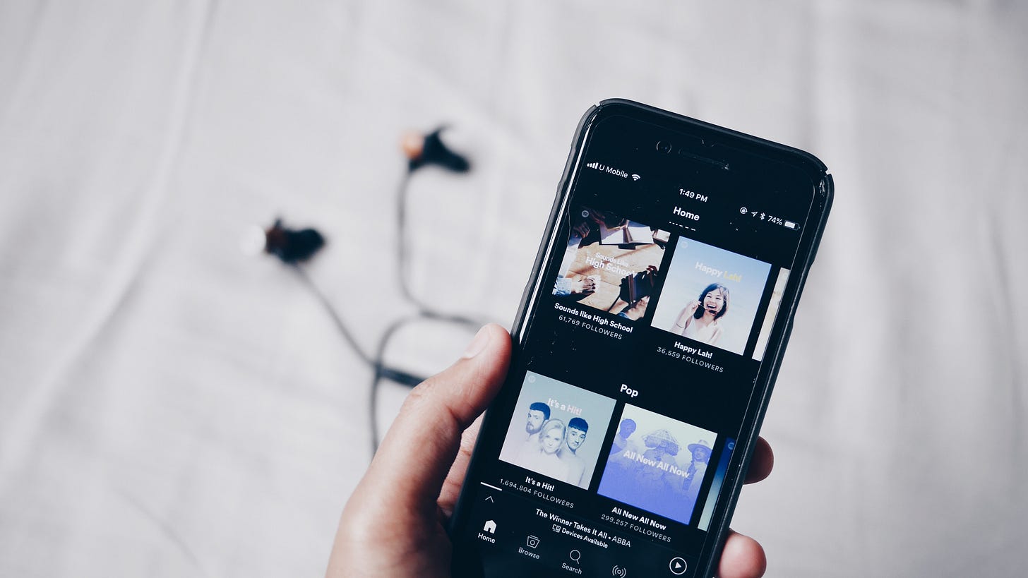 The Spotify app open on a smartphone. (Fixelgraphy / Unsplash)
