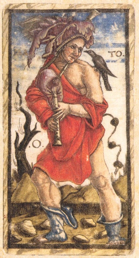 A figure in a red toga-like garment plays what looks like a bag pipe. A crow is on the figure's left shoulder, and the backdrop is a dry landscape, with rocks and a tree without leaves.