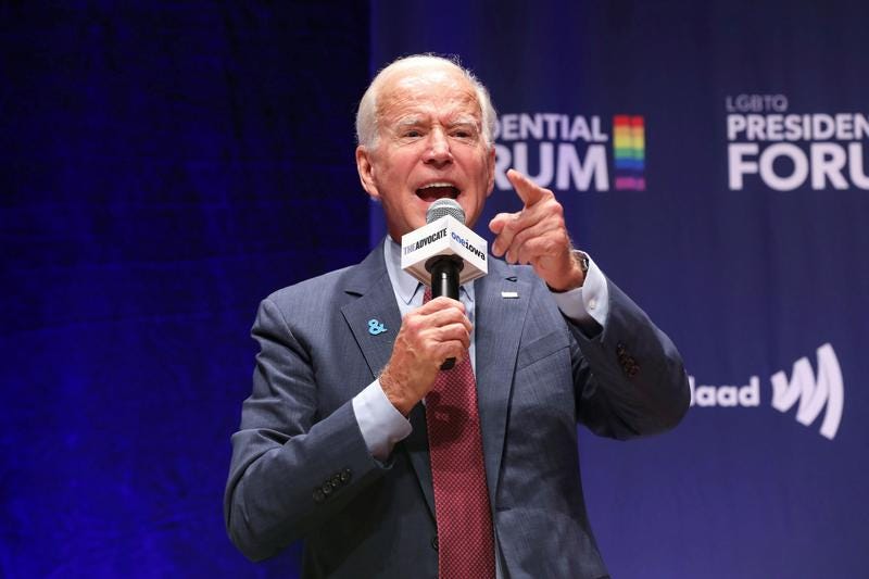 Biden's LGBTQ record draws scrutiny at Iowa presidential forum | Reuters