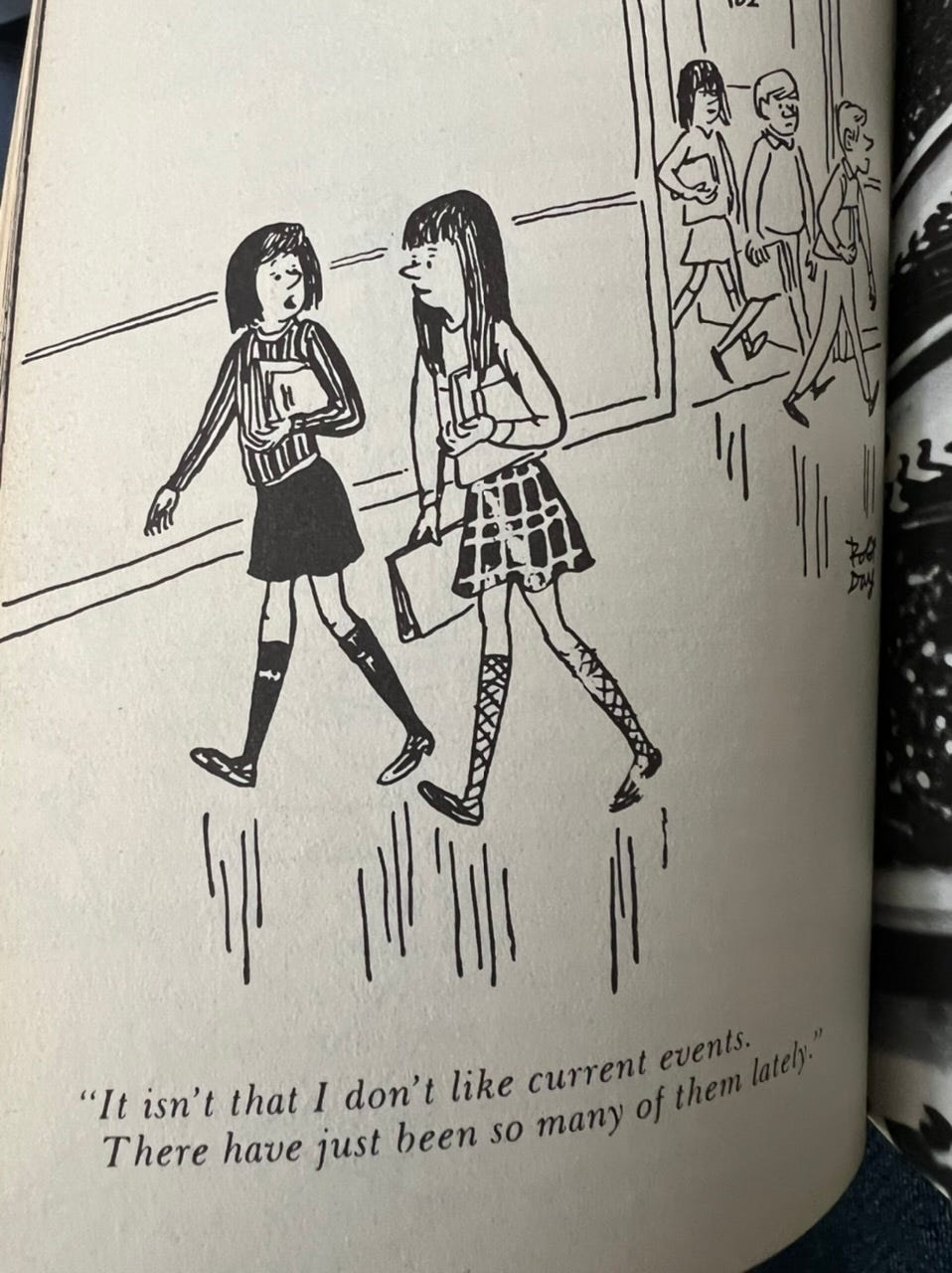 Cartoon of two female presenting students talking. One says to the other “It’s not that I don’t like current events. There have just been so many lately.”
