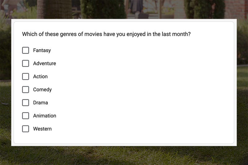A quiz over a video that says "Which of these genres of movies have you enjoyed in the last month?" with checkboxes next to genres.