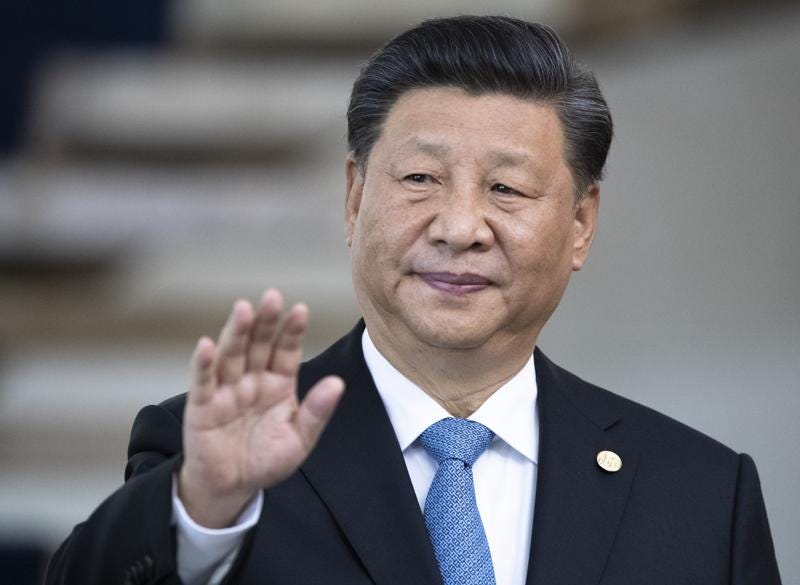 FILE - China's President Xi Jinping greets the media prior to a meeting of leaders of the BRICS emerging economies at the Itamaraty palace in Brasilia, Brazil, on Nov. 14, 2019. Xi has landed Nur-Sultan, Kazakhstan, Wednesday, Sept. 14, 2022, started his first foreign trip abroad since the outbreak of the pandemic ahead of a summit with Russia’s Vladimir Putin and other leaders of a Central Asian security group. (AP Photo/Pavel Golovkin, Pool, File)