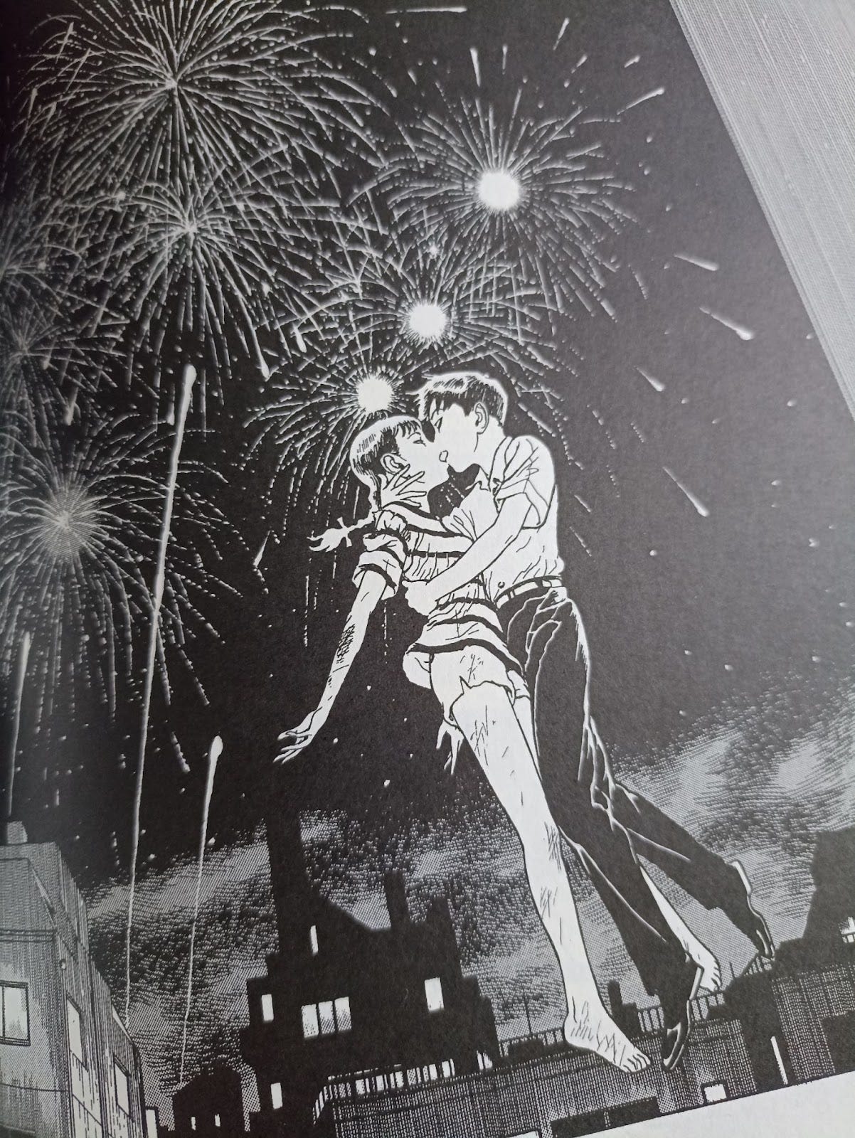 Hermosa imagen donde Mori y Luna se besan, suspendidos en el firmamento por sus poderes vampíricos, mientras tras ellos explotan fuegos artificiales.
