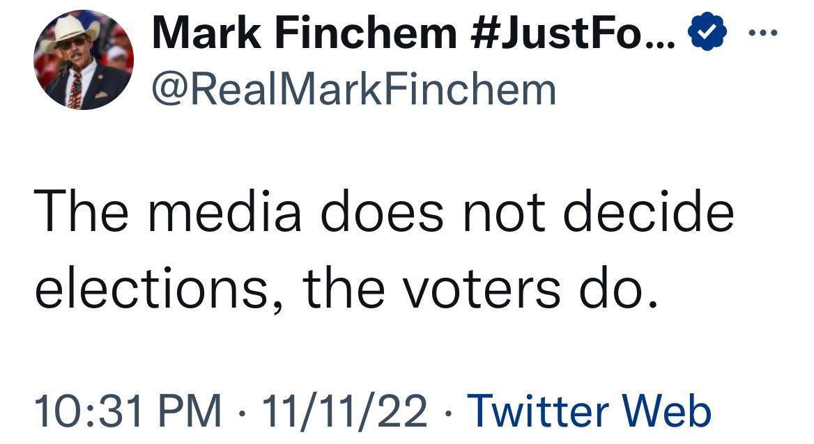 May be a Twitter screenshot of 2 people and text that says 'Mark Finchem #JustFo... @RealMarkFinchem The media does not decide elections, the voters do. 10:31 PM 11/11/22 Twitter Web'