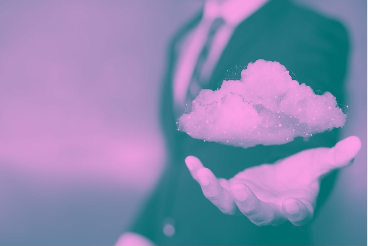 A human hand of a person in a suit holding a floating image of a cloud.