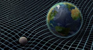 Teoria da relatividade - Planeta terra numa rede no espaço ao lado de outro planeta bem pequeno
